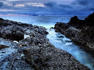 rocks, clouds, sea